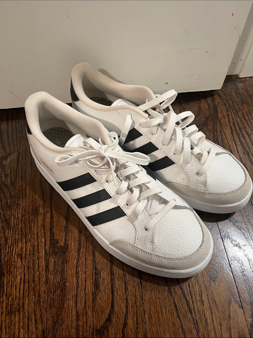 adidas Men’s White Sneakers with Black Stripes